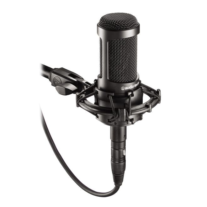 AT2035 microphone mounted in shock mount on boom stand with connected XLR cable