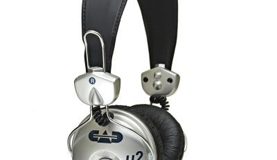 Pair of silver and black headphones on a white background