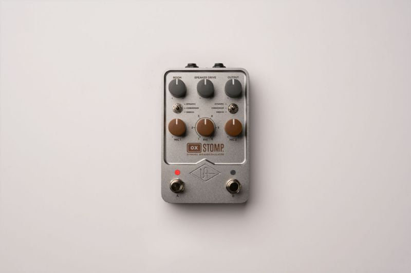 Universal Audio OX Stomp - Front view with control knobs and footswitches.