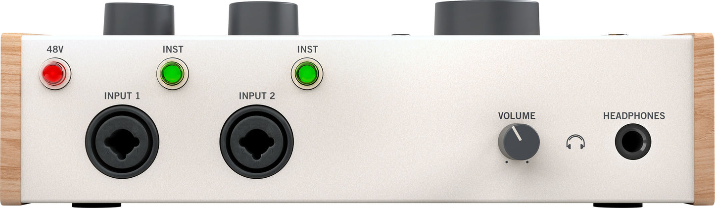 Audio interface with input jacks, volume control, and headphone output on a white background