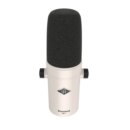 Microphone with foam cover on a white background