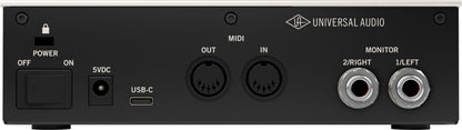 Back panel of a Universal Audio audio interface with various connectors.