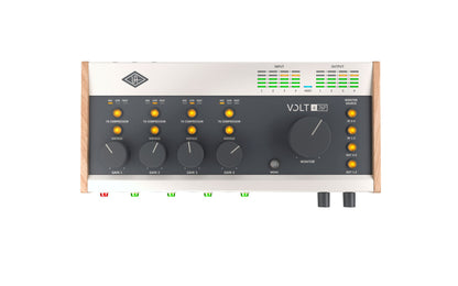 Audio interface with control knobs and display on a white background