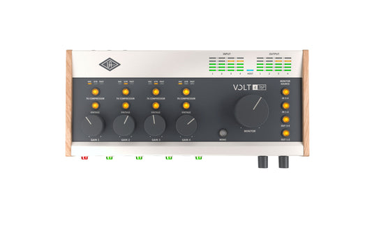 Audio interface with control knobs and display on a white background