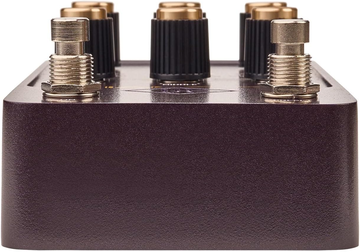 Angled rear view of the Universal Audio UAFX Lion ’68 showing audio connections, control knobs, and metal enclosure