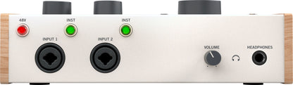 Audio interface with input jacks, volume control, and headphone output on a white background