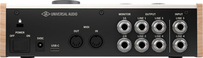 Back panel of a Universal Audio audio interface with various connectors and labels.